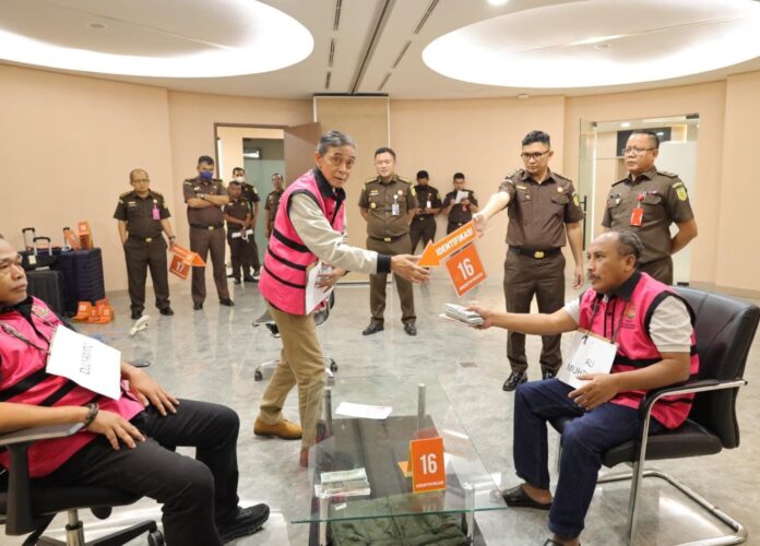 Kejagung Gelar Rekonstruksi Kasus Suap Hakim di Kasus Korupsi Minyak Sawit