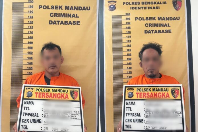 Dua tersangka Tindak Pidana Kekerasan Seksual diamankan di Mapolsek Mandau, Kabupaten Bengkalis